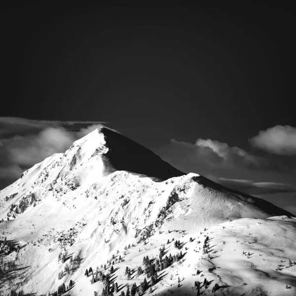 Panoramic mountain black and white snow landscape. Giau Pass. Dolomites, Italy.