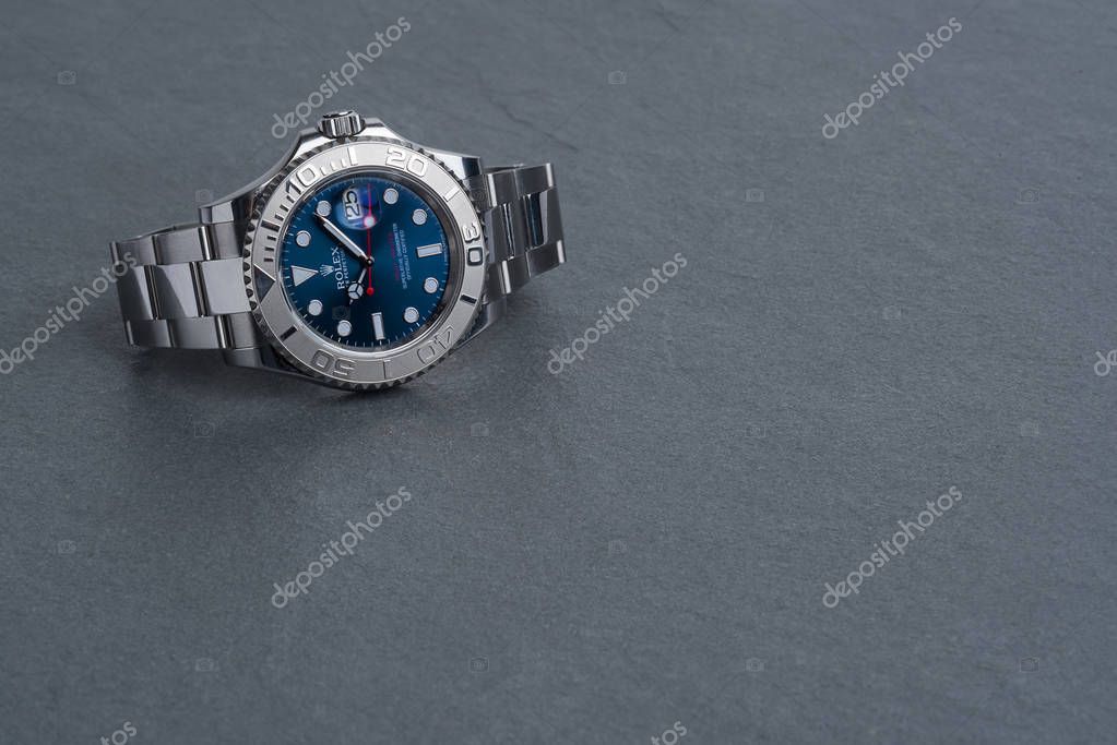 Rolex Oyster Perpetual Date Yacht Master watch on grey background