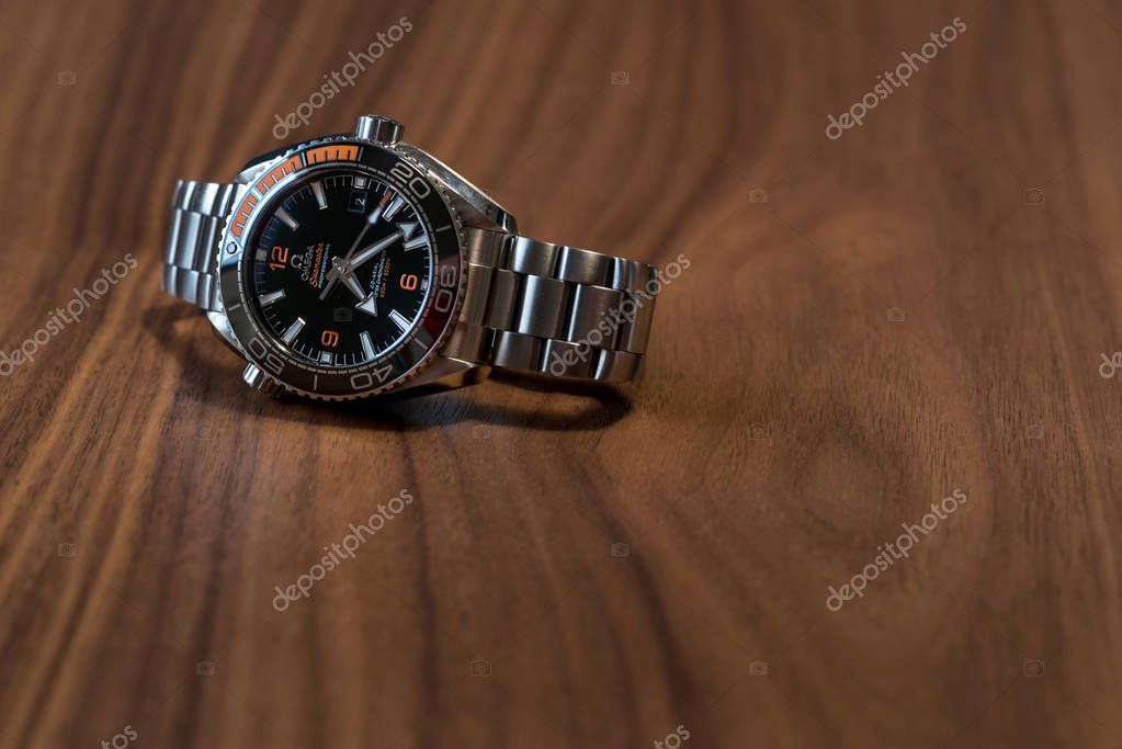 Omega Seamaster Professional diver watch on wooden table