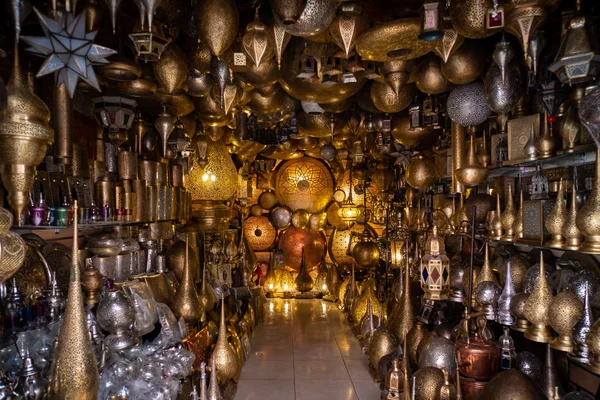 Moroccan metal lamps in a shop in the medina. Marrakech, Morocco.