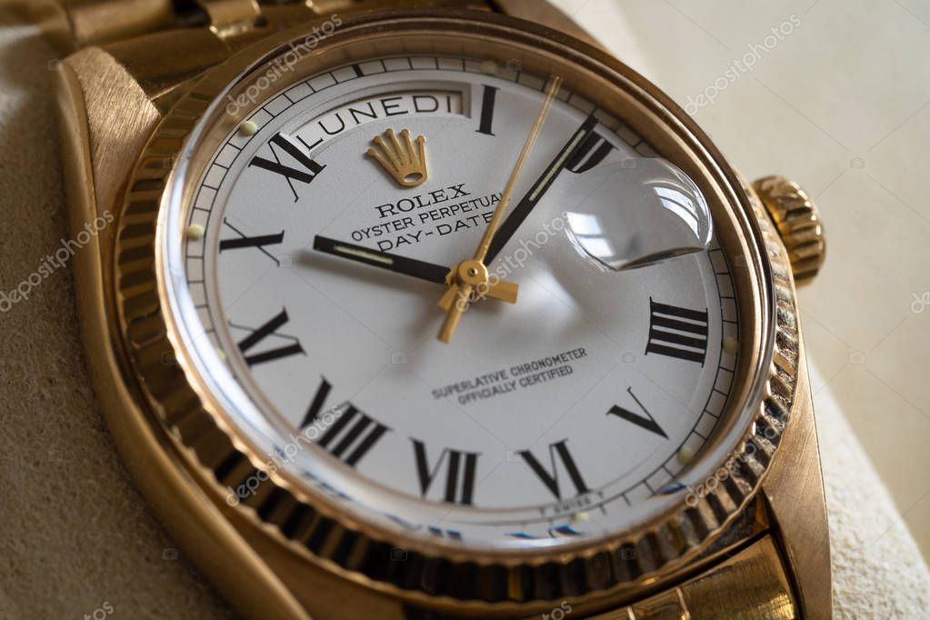Rolex Oyster Perpetual Day Date gold watch, close up shot