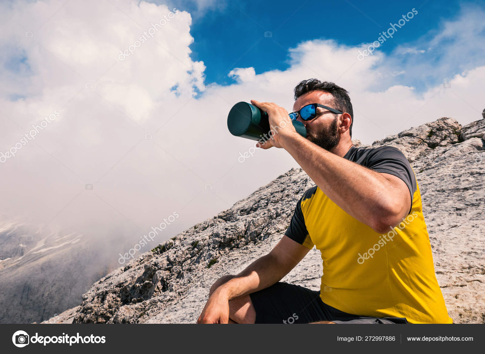 Man Relaxing Drinking Water Trekking Dolomites Mountains Background