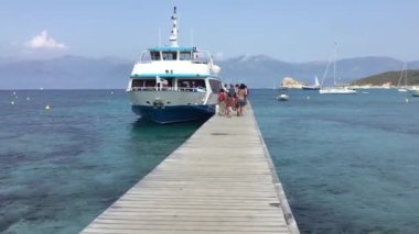 SAINT FLORENT (CORSICA), FRANCE - JULY 5, 2016: Ferry boat to Lotu beach at daytime.
