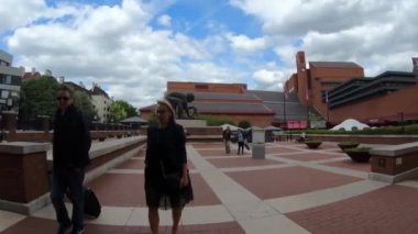LONDON - MAY, 2018: POV Entering gate British Library gate, designed by Lida and David Kindersley. British Library, national library, was separated from British Museum in 1973.