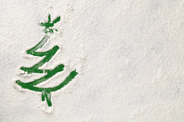 雪粉の背景にクリスマスツリー — ストック写真
