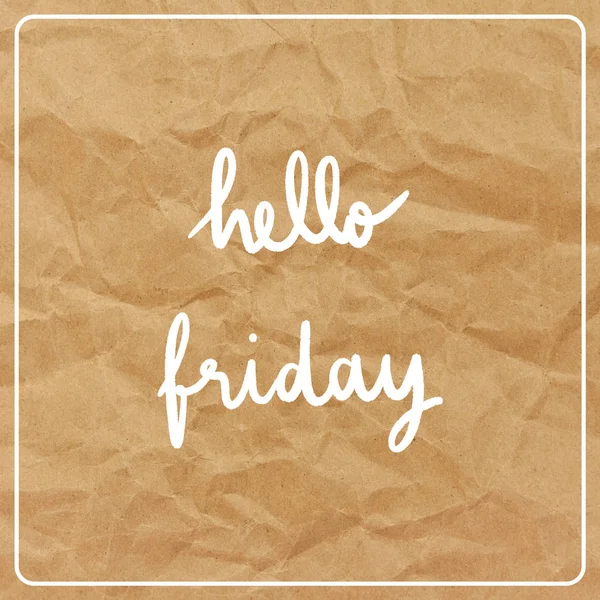 Hello Friday on brown crumpled paper background.