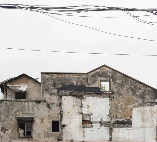 Abandoned building with electric cables — Stock Photo, Image