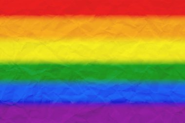 LGBT gurur bayrağı veya arka plan için buruşuk kağıt üzerinde Gökkuşağı gurur bayrağı.