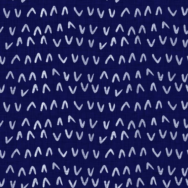 Seamless indigo block print texture. Navy blue woven cotton dyed effect background. Japanese repeat batik resist motif pattern. Asian fusion all over textile blur cloth print.