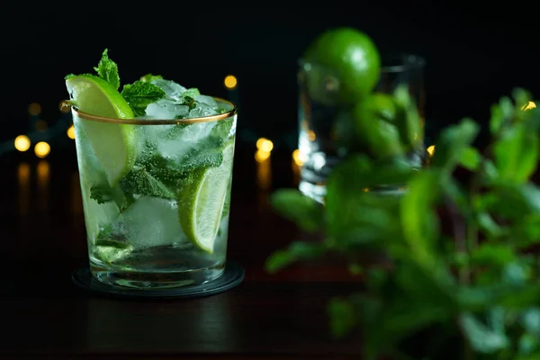 Mojito served in a glass with gold rim