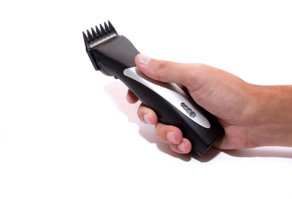 Eine Friseurmaschine Friseurladen Haarschneidemaschine Der Hand Isoliert Auf Weißem Hintergrund — Stockfoto