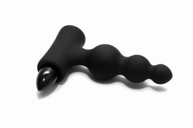 Beyaz arka plan üzerinde izole siyah anal vibratör. Yukarıdan görüntülemek