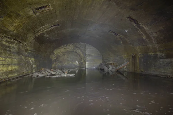 Underground gold mine shaft tunnel drift with fog