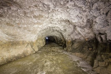 Underground gold mine shaft tunnel drift with ice and snow