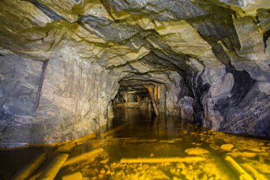 Underground gold mine shaft tunnel drift flooded with water