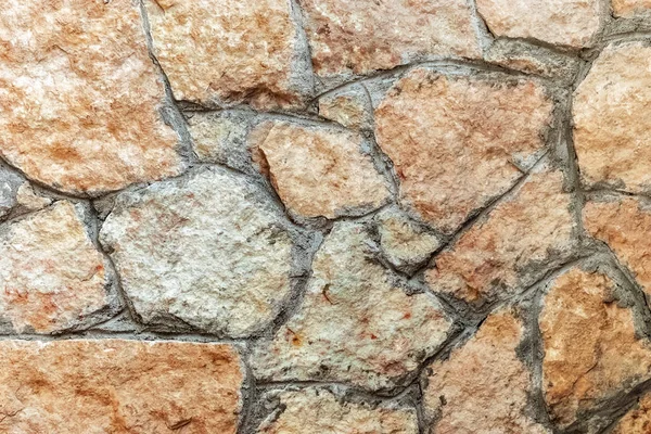Fragmento de un muro de piedra . — Foto de Stock