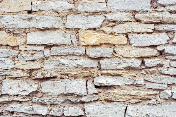 Fragmento de un muro de piedra . — Foto de Stock