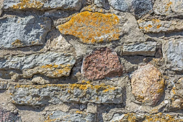 Fragmento de un muro de piedra . — Foto de Stock