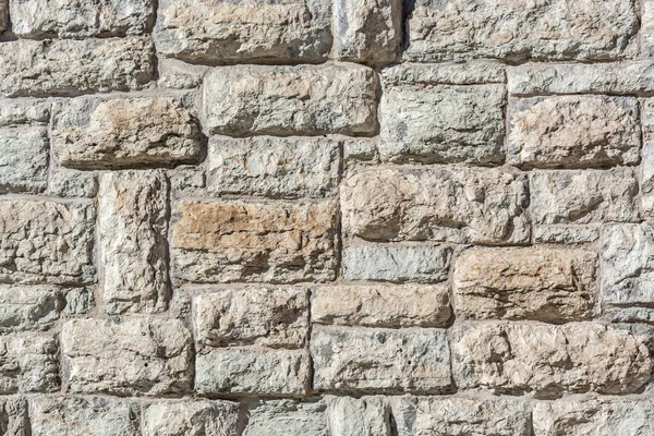 Fragment van een oude stenen muur. — Stockfoto
