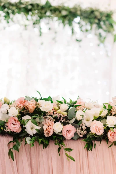 Stylish decor with fresh flowers of cute wedding table