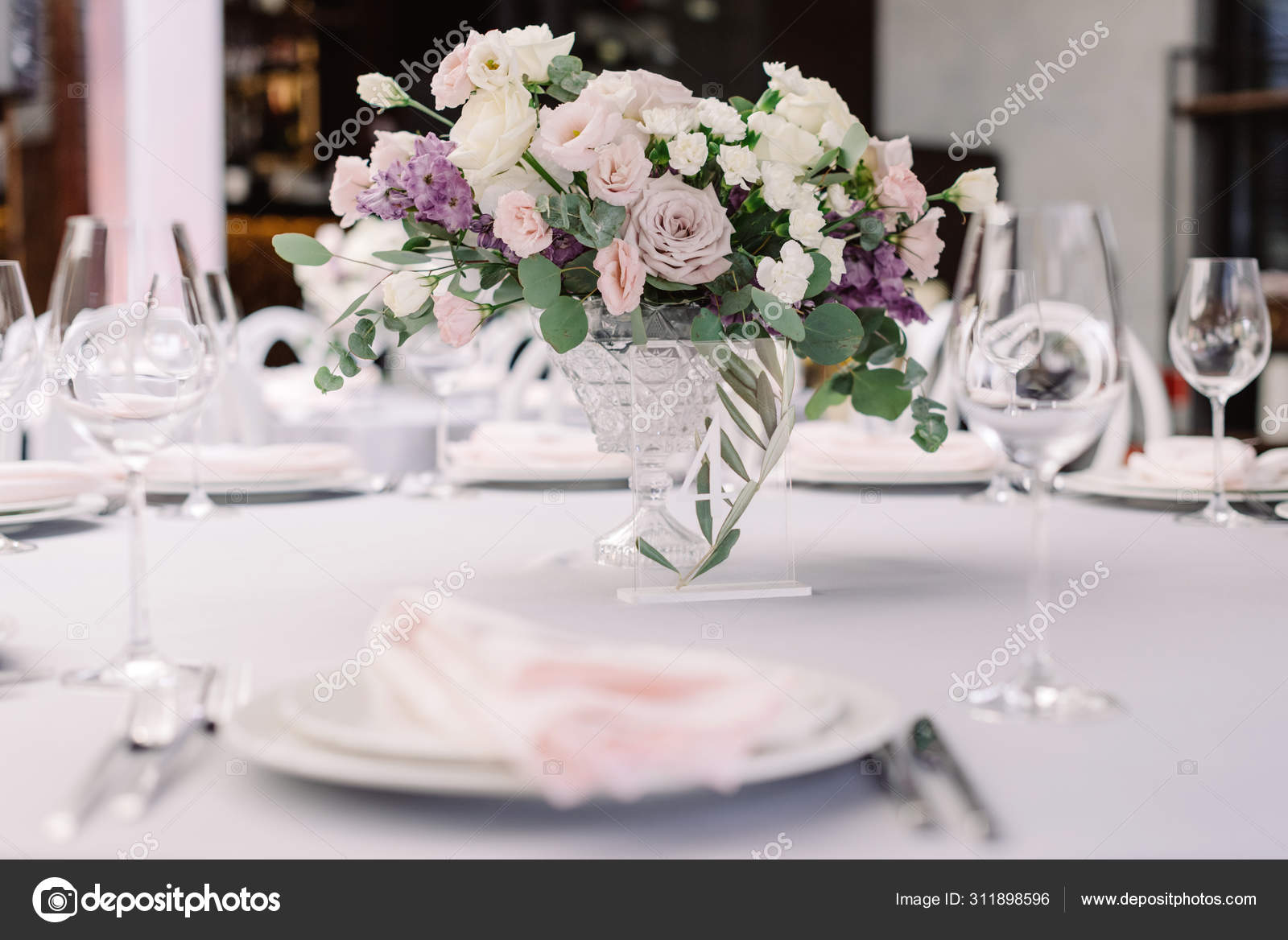 Luxurious Fresh Flowers In A Glass Vase Decorate The Wedding Dining Table Stock Photo Image By C Olgaburtseva 311898596
