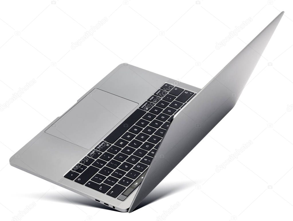 Hovering aluminium laptop with blank screen and new design, isolated on a white background.