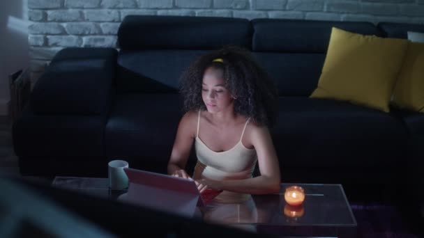 Young Latina Woman Typing Message on Laptop At Night — Stock Video