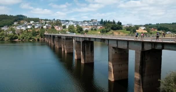 Pilgrims Walking Bridge Lake Portomarin Spanish Town Camino Santiago Way — Stock Video