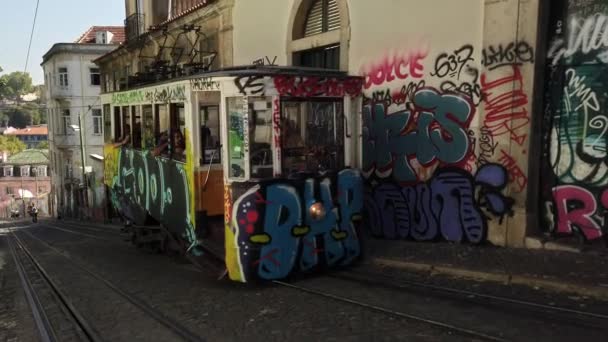 View of Lisbon Portugal With Streetcar And Graffiti — Stock Video