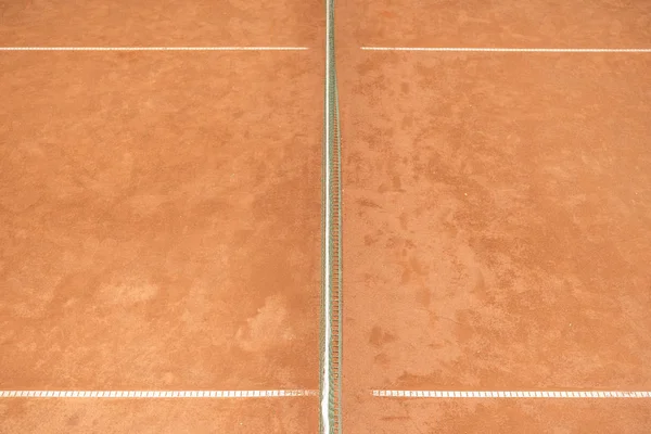 Textura de cancha de tenis marrón con red de tenis para el juego - foto de stock