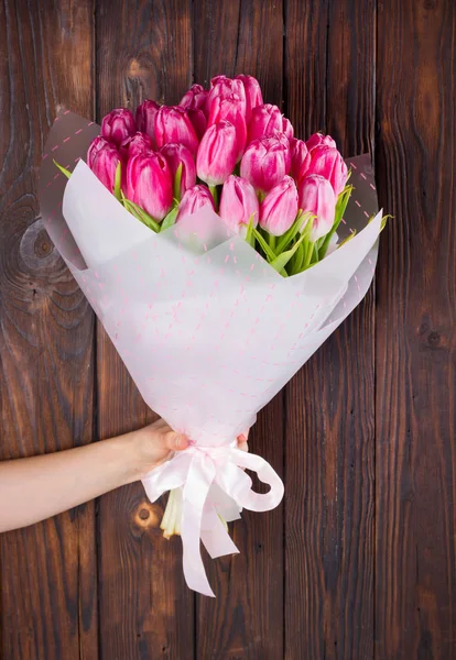 Woman Hand Holding Bouquet Tulips Flowers Packing Wood Background — Stock Photo, Image