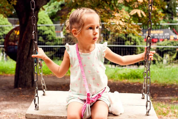 Portrait Swinging Girl Stock Picture