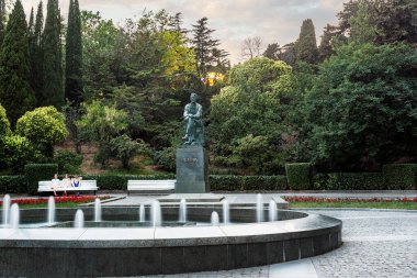 Seaside Park is one of the attractions of Yalta and one of the most beautiful parks on the black sea coast. There is a monument to Anton Chekhov, who lived in Yalta. Beautiful fountains, stairs, exotic trees clipart