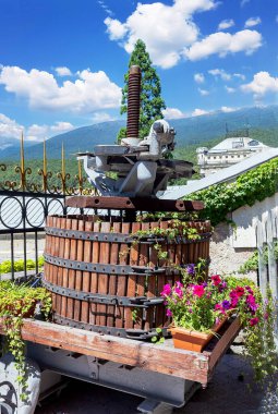 Masandra winery is one of the oldest wine producers in Crimea. The old grape press has been preserved and is now on display as a historical exhibi clipart
