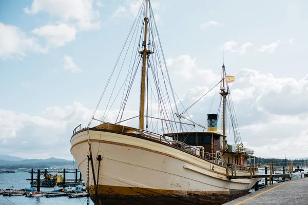 Old wooden ship docked in a harbour, O Grove, Spain