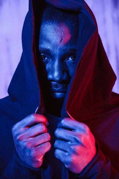 Crop View African American Male Covering Face Black Hoodie Looking — Stock Photo, Image