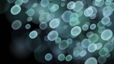 Gri renklerde bokeh efektleri içeren soyut arkaplan