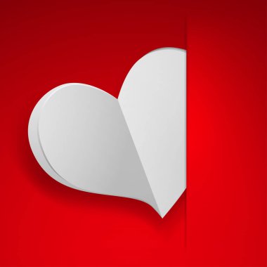 Bir kesme kırmızı bir kağıdın içinde eklenen büyük beyaz kalp