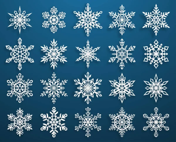 一套漂亮而复杂的纸圣诞雪花 阴影柔和 背景为蓝色 — 图库矢量图片