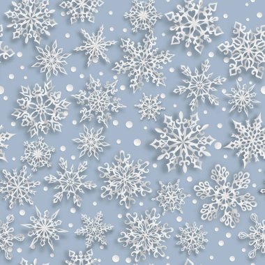 Açık mavi arka planda yumuşak gölgeleri olan pürüzsüz kar taneleri.