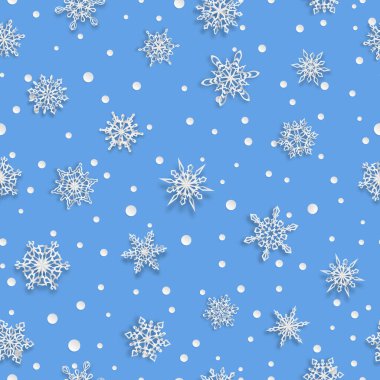 Açık mavi arka planda yumuşak gölgeleri olan pürüzsüz kar taneleri.