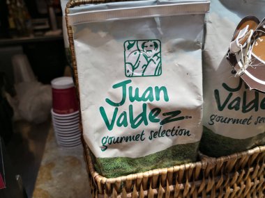 Colombian coffee bag with denomination of origin and gourmet selection of Juan Valdez brand. clipart