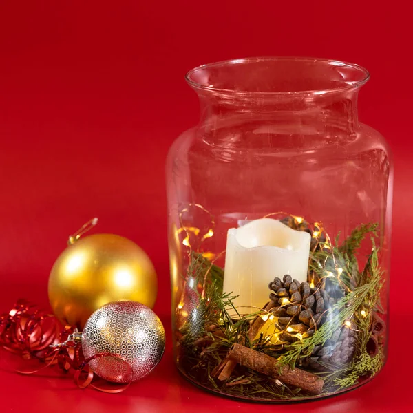 Christmas Toy Decor Candle Jar Red Background — Stock Photo, Image