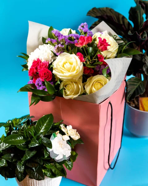 Flower bouquet in the box with gardenia plant