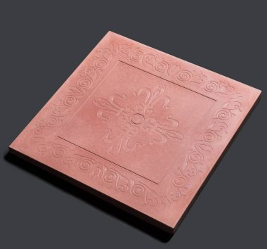 Yerden bir örnek, tek renkli arka planda duvar taşı şekli.