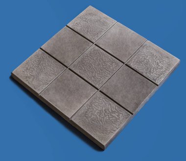 Yerden bir örnek, tek renkli arka planda duvar taşı şekli.