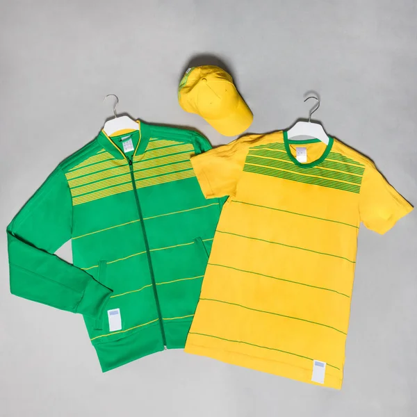 Green and yellow soccer t-shirt design slim-fitting with a cap top view