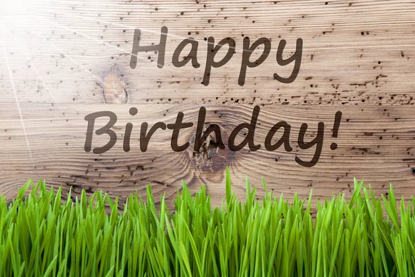 Fundo de madeira ensolarado brilhante, Gras, texto feliz aniversário — Fotografia de Stock