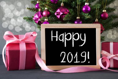 Ağaç hediyeler, Bokeh, metin mutlu 2019