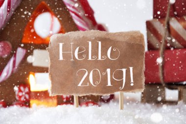 Gingerbread House ile kızak, kar taneleri, metin Merhaba 2019